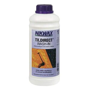 Nikwax Tx Direct 1l Pflegemittel für Funktionsbekleidung mit lila Deckel und wasserdichten Eigenschaften, in einer weißen Flasche abgebildet.