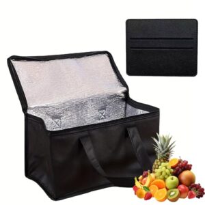 Faltbare Kühltasche in Schwarz aus strapazierfähigem Material mit silberner Isolierung im Inneren, ideal für den Transport von Lebensmitteln, umgeben von frischen Früchten wie Ananas und Äpfeln.