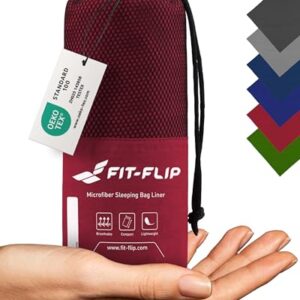 Ultraleichter Hüttenschlafsack aus Mikrofaser in komprimierter Verpackung mit Kordelzug, ideal für Reisen, Camping und Backpacking.