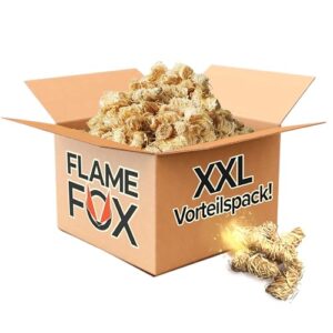 Flame Fox Anzündwolle XXL 10kg in einem geöffneten Karton, gefüllt mit naturnahen, brennbaren Bündeln aus Holzwolle und Wachs, ideal für Kamin, Grill und Feuerschale.