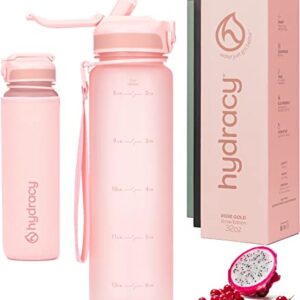 Hydracy Trinkflasche mit Strohhalm und Zeitmarkierung in Rosa, 1L BPA-frei, ideale Sportflasche für Hydration unterwegs mit Auslaufschutz.