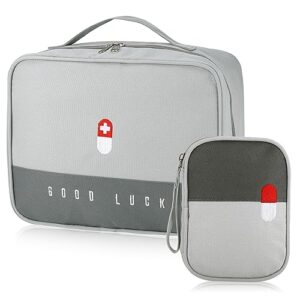 Zwei moderne, wasserdichte Medikamententaschen in Grau, eine große und eine kleine, ideal für die Aufbewahrung von Medikamenten und Erste-Hilfe-Utensilien auf Reisen oder im Büro.