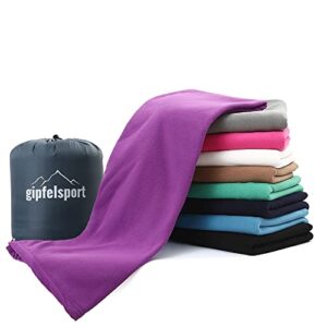 Mikrofaser Fleece Decke in lila mit Schlafsackfunktion, ideal für Camping und Reisen, Größe 185 x 150 cm.