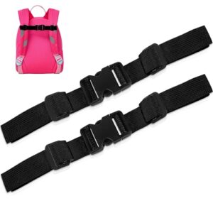 Zwei schwarze verstellbare Brustgurte aus robustem Nylon mit Kunststoffverschluss, ideal für Rucksäcke und Outdoor-Aktivitäten, abgebildet in Verbindung mit einem pinken Rucksack.