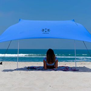 Neso Strandzelt mit Sandanker, tragbares Sonnendach in Blau, bietet Schutz vor UV-Strahlen am Strand.