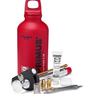 Primus Unisex Multifuel Kit für ETA Spider oder Express, bestehend aus einer roten Treibstoffflasche, Brenner, Zündmechanismus und Zubehörteilen, ideal für Outdoor-Aktivitäten und Camping.