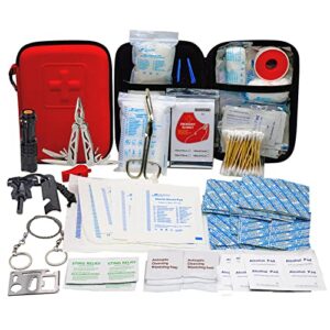 Umfassendes Erste Hilfe Set und Survival Kit in roter Tasche mit wichtigen medizinischen Utensilien, geeignet für Outdoor und Notfällen.