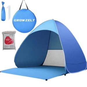 XXL Strandmuschel Pop Up in Blautönen mit UV-Schutz 50+, ideal für Strand und Outdoor, bietet Platz für 3-5 Personen, leicht aufzustellen.