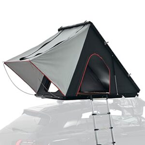 Prime Tech Hartschalen-Autodachzelt Gamma XL in schwarz und grau auf einem Fahrzeug montiert, ideal für Abenteuerreisen und Camping