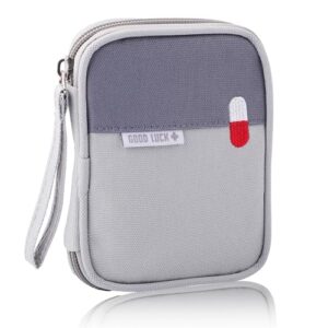 Tragbare Reiseapotheke Tasche in Grau für Medikamente und Erste Hilfe Utensilien, wasserdicht und kompakt, ideal für unterwegs.