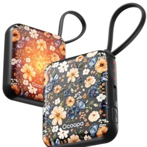 Zwei elektrische Handwärmer in schwarz mit floraler Musterung und OCOOPA-Logo, für Weihnachtsgeschenk oder Winter-Ski-Touren geeignet