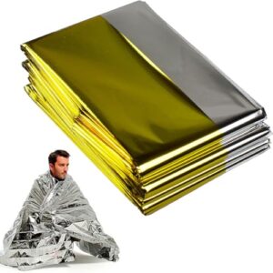 Drei Teile einer Rettungsdecke, ein Survival-Kit für Outdoor-Aktivitäten und Notfälle, mit Schutz vor Kälte, Regen und Wind.