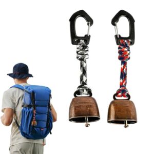 Zwei Bärenglocken aus Gusseisen mit Schalldämpfern für outdoor Aktivitäten wie Wandern und Camping. Robuste und lautstark.
