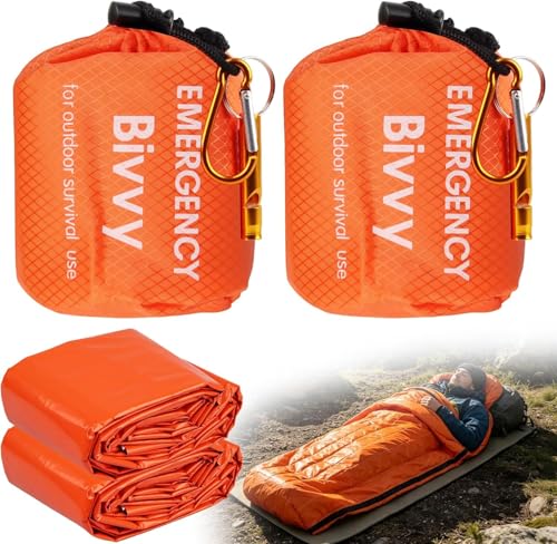 Zwei ultraleichte Notfallschlafsäcke für Camping, Wandern und Outdoor-Aktivitäten mit Wärmeerhalt bis 95% und Wasserdichtigkeit.