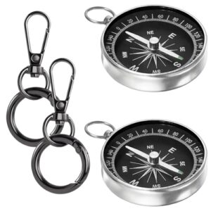 Zwei Schlüsselanhänger mit Kompass, wasserdicht und widerstandsfähig gegenüber Wetterbedingungen, ideal für Outdoor-Aktivitäten wie Wandern und Camping.